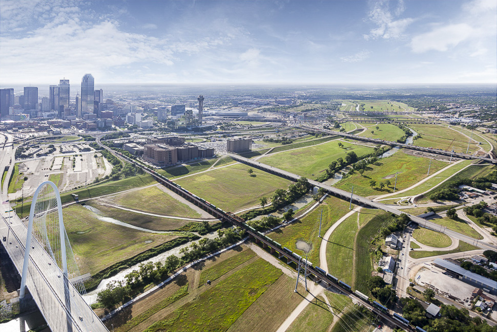 View of the Trinity River ﬂoodway looking southeast with the Margaret McDermott Bridge and the Trinity Skyline Trail along the Trinity River. . [ Photo: Courtesy of The Trinity Trust Foundation/Produced by Michael Van Valkenburgh Associates ]
